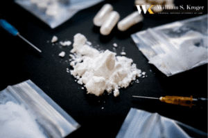 Is It Illegal to Possess a Firearm with a Controlled Substance in California?